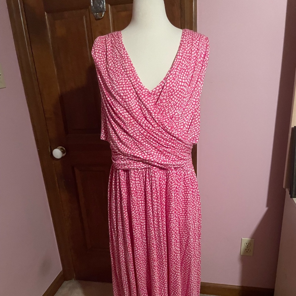 Pink and white sleeveless dress.